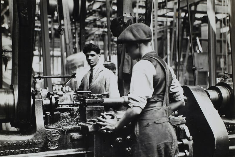 Historical labor scene during the Industrial Revolution