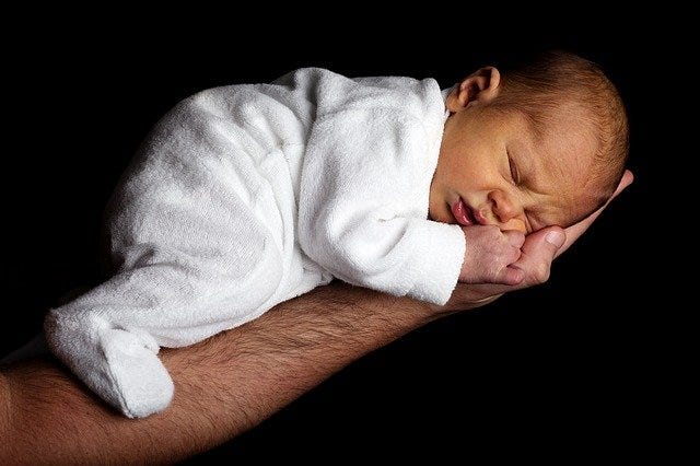 Newborn baby resting peacefully